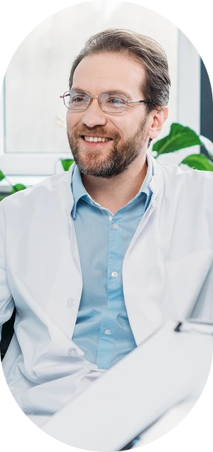 Scientists In Lab Coats And Eyeglasses Discussing