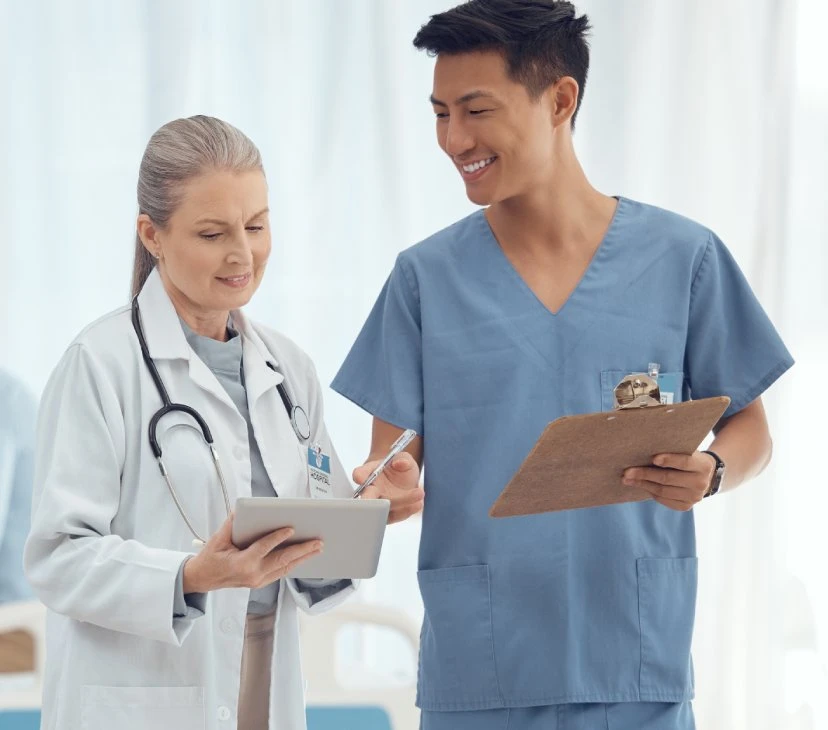 Teamwork Happy Doctors With Tablet Checklist Hospital Meeting Discussion