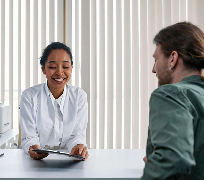A smiling doctor with a stethoscope